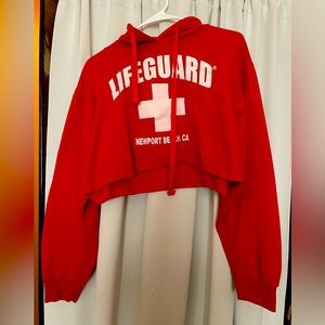 Cropped Newport Beach lifeguard sweater.